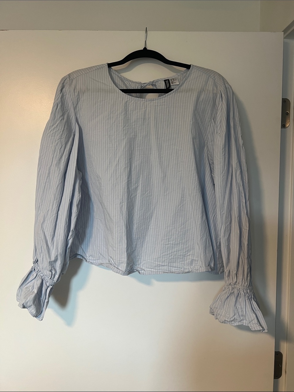 Striped blouse with bows